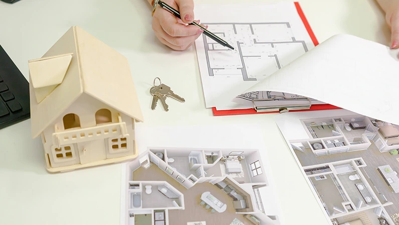 Commercial residential design miniature, a key and a sketch