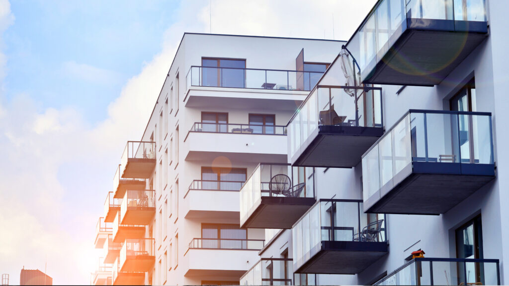Modern and new apartment building. Multistoried modern, new and stylish living block of flats.